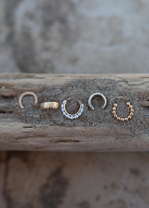Ear cuffs shown in different styles