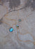 Alternate view of three Nereida abalone and gold necklaces