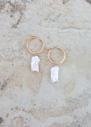Gold thick hoops with white pearl nuggets