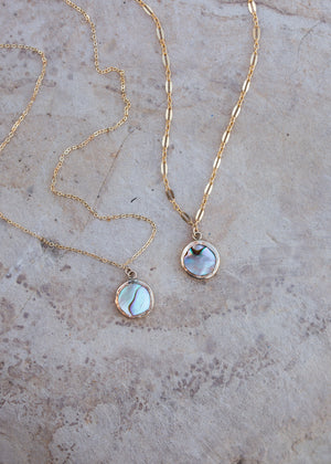 Side by side of the two chain options, the left shows the dainty 1.2mm cable chain and the right shows the dapped sparkle chain