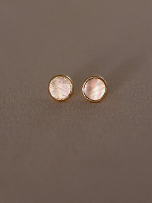 Pair of round earrings with gold rims and mother of pearl rainbow inlay